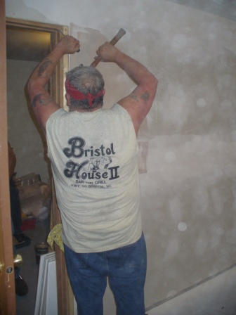 Lyle working on dry wall